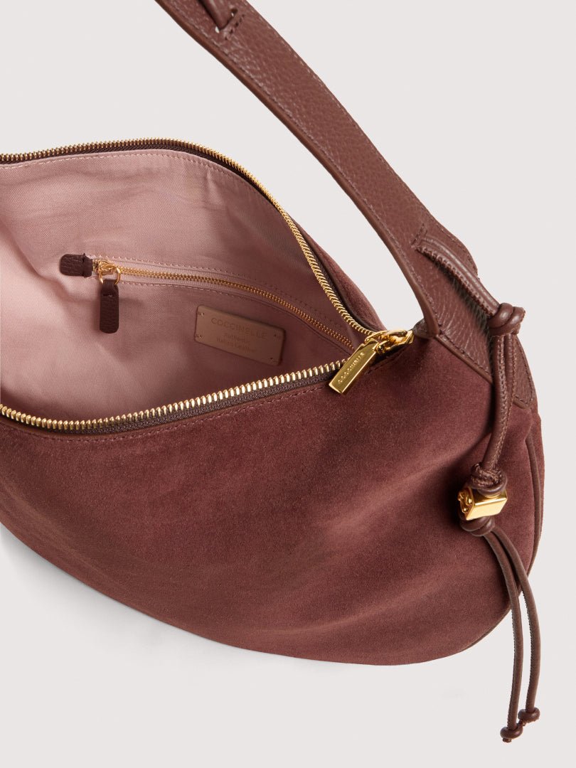 Τσάντα ώμου Thess Suede σε μπορντό - Coccinelle | E1VCB130101-R49